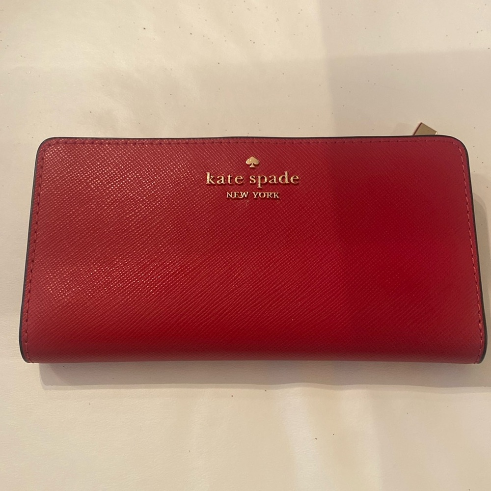KateSpade medium red wallet. Pairs with my closets’ Red KateSpade handbag.